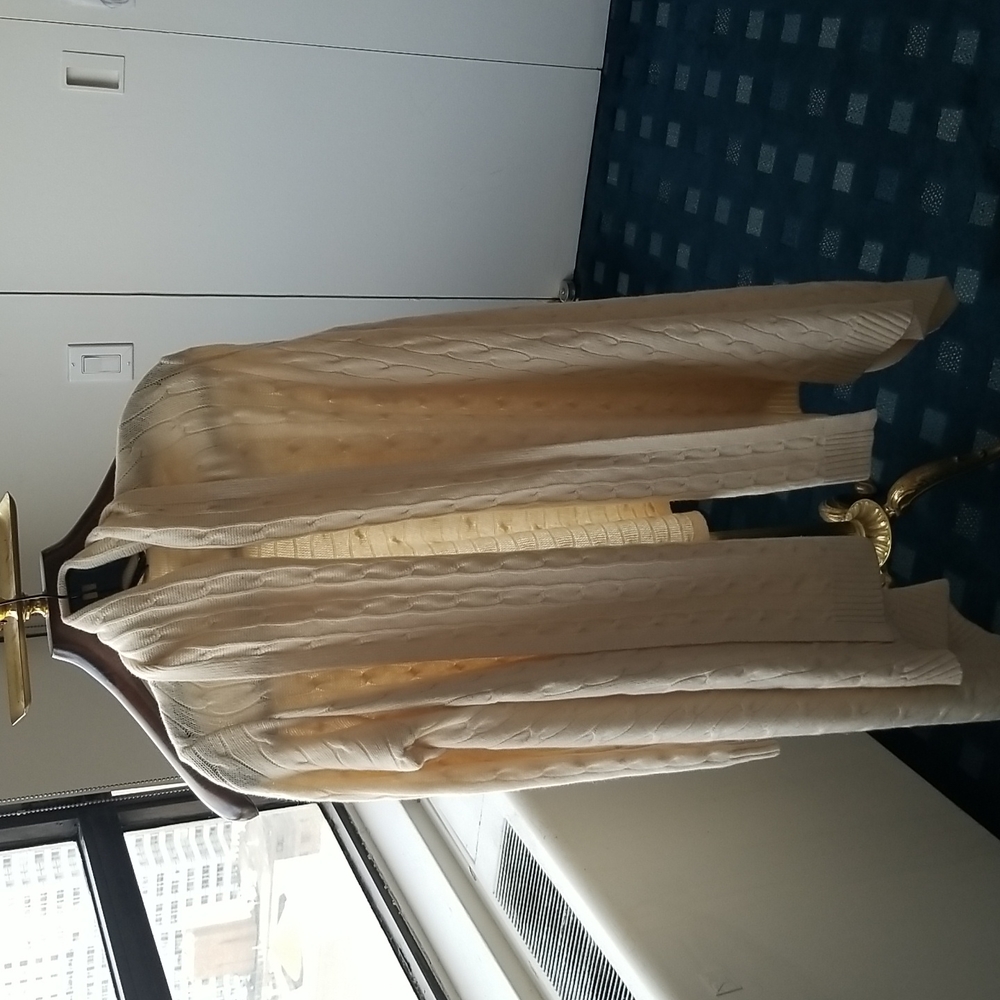 Cream colored wool and cashmere cable knit long sleeve shawl neck long sweater.